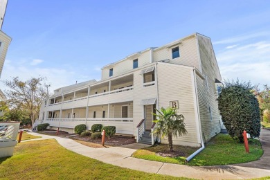 This North Myrtle Beach condo is a perfect beachside retreat on Possum Trot Golf Course in South Carolina - for sale on GolfHomes.com, golf home, golf lot