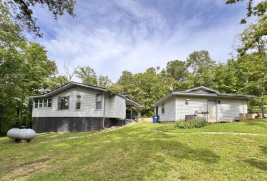 Updated 3 bedroom 1.5 bath house on about 0.6 acres, with a on Cherokee Village North Course in Arkansas - for sale on GolfHomes.com, golf home, golf lot