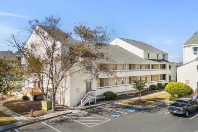 This North Myrtle Beach condo is a perfect beachside retreat on Possum Trot Golf Course in South Carolina - for sale on GolfHomes.com, golf home, golf lot