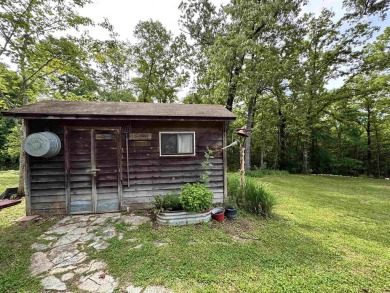 Updated 3 bedroom 1.5 bath house on about 0.6 acres, with a on Cherokee Village North Course in Arkansas - for sale on GolfHomes.com, golf home, golf lot
