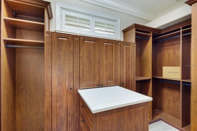 Set on a premium golf course lot boasting over a half acre on Legacy Golf Club in Florida - for sale on GolfHomes.com, golf home, golf lot