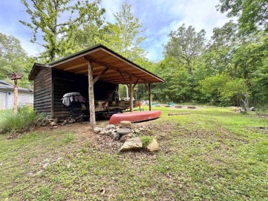 Updated 3 bedroom 1.5 bath house on about 0.6 acres, with a on Cherokee Village North Course in Arkansas - for sale on GolfHomes.com, golf home, golf lot