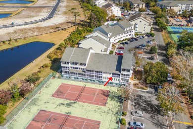 This North Myrtle Beach condo is a perfect beachside retreat on Possum Trot Golf Course in South Carolina - for sale on GolfHomes.com, golf home, golf lot