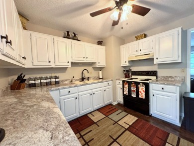Updated 3 bedroom 1.5 bath house on about 0.6 acres, with a on Cherokee Village North Course in Arkansas - for sale on GolfHomes.com, golf home, golf lot