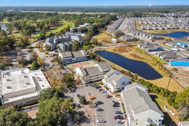 This North Myrtle Beach condo is a perfect beachside retreat on Possum Trot Golf Course in South Carolina - for sale on GolfHomes.com, golf home, golf lot