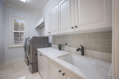 Set on a premium golf course lot boasting over a half acre on Legacy Golf Club in Florida - for sale on GolfHomes.com, golf home, golf lot