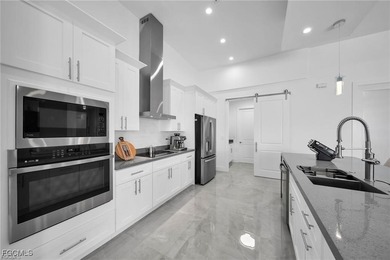 EXTRAORDINARY AND CONTEMPORARY HOME ! near a Golf Course. NO HOA on Burnt Store Golf Club in Florida - for sale on GolfHomes.com, golf home, golf lot