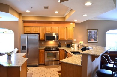 Golf-front luxury meets turnkey convenience in this beautifully on  in Missouri - for sale on GolfHomes.com, golf home, golf lot