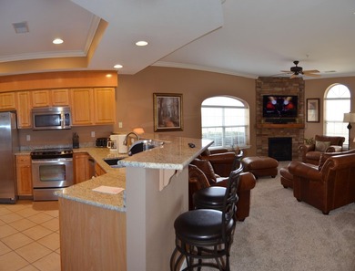 Golf-front luxury meets turnkey convenience in this beautifully on  in Missouri - for sale on GolfHomes.com, golf home, golf lot