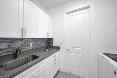 EXTRAORDINARY AND CONTEMPORARY HOME ! near a Golf Course. NO HOA on Burnt Store Golf Club in Florida - for sale on GolfHomes.com, golf home, golf lot