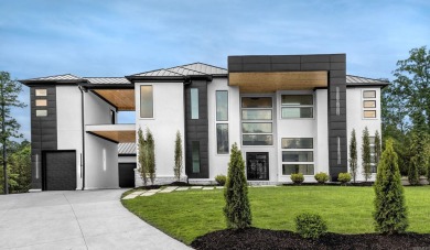 EXQUISITE MODERN LUXURY! Surrounding this gated spread is a on Chenal Country Club - Bear Den Mountain in Arkansas - for sale on GolfHomes.com, golf home, golf lot