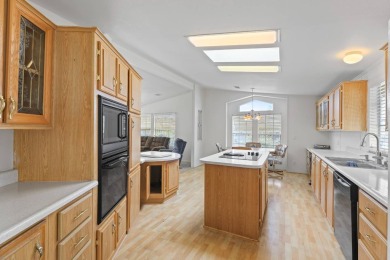 Spacious 3-bedroom, 2-bath home featuring a huge open-concept on Apache Creek Golf Club in Arizona - for sale on GolfHomes.com, golf home, golf lot