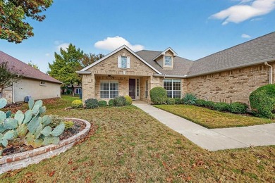 Fall in love with this inviting Palmera model, situated just on Wildhorse Golf Club of Robson Ranch in Texas - for sale on GolfHomes.com, golf home, golf lot