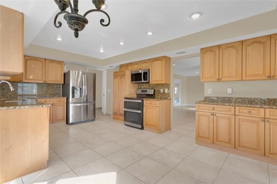 Experience an extraordinary confluence of generous space on Rio Pinar Golf and Country Club in Florida - for sale on GolfHomes.com, golf home, golf lot