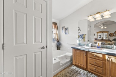 Step into this spacious and meticulously cared-for home on Augusta Ranch Golf Club in Arizona - for sale on GolfHomes.com, golf home, golf lot