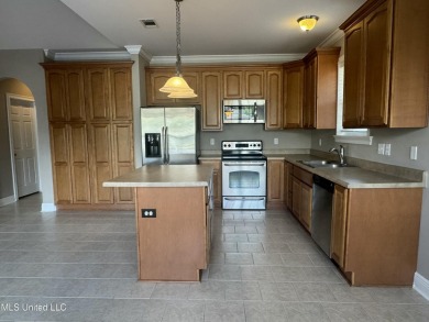 Welcome to this beautiful newly renovated 3-bedroom, 2-bath on Diamondhead Country Club in Mississippi - for sale on GolfHomes.com, golf home, golf lot