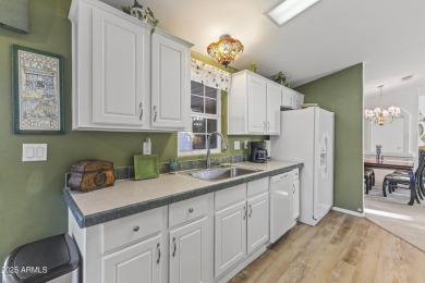 Step into this spacious and meticulously cared-for home on Augusta Ranch Golf Club in Arizona - for sale on GolfHomes.com, golf home, golf lot