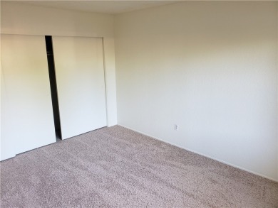 Don't miss out on this great downstairs 2-bedroom, 1-bath condo on Diamond Bar Golf Course in California - for sale on GolfHomes.com, golf home, golf lot