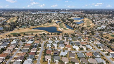 Welcome to this charming 3-bedroom, 2-bathroom Gardenia home on The Links of Spruce Creek in Florida - for sale on GolfHomes.com, golf home, golf lot