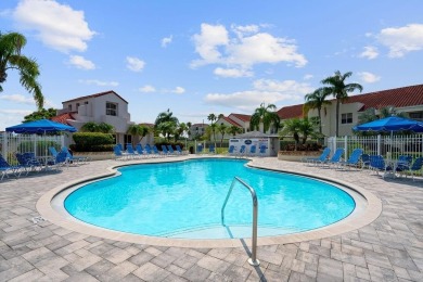 **RECENT PRICE REDUCTION - MOTIVATED SELLER**. Nestled within on Isla Del Sol Yacht and Country Club in Florida - for sale on GolfHomes.com, golf home, golf lot