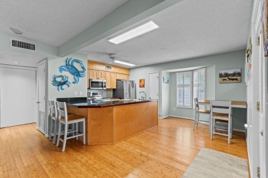 Charming First-Floor Villa Overlooking the Racquet Club on on The Seabrook Island Club in South Carolina - for sale on GolfHomes.com, golf home, golf lot
