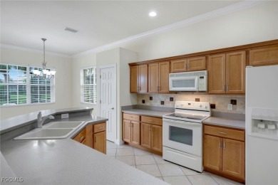 This is a well-maintained home in Crown Colony, close to a on Crown Colony Golf and Country Club in Florida - for sale on GolfHomes.com, golf home, golf lot
