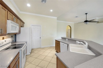 This is a well-maintained home in Crown Colony, close to a on Crown Colony Golf and Country Club in Florida - for sale on GolfHomes.com, golf home, golf lot