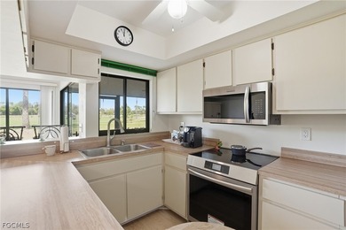 Welcome to this beautifully maintained turnkey ground-floor on Hideaway Country Club in Florida - for sale on GolfHomes.com, golf home, golf lot