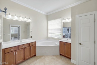 This is a well-maintained home in Crown Colony, close to a on Crown Colony Golf and Country Club in Florida - for sale on GolfHomes.com, golf home, golf lot