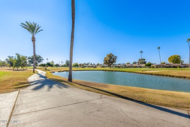 SELLER TO PAY FIRST 10 YEARS OF SOLAR PAYMENT! Welcome to your on Sun City Lakes West and East in Arizona - for sale on GolfHomes.com, golf home, golf lot