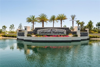 NEW FLOORS THROUGHOUT!  Experience the ultimate in resort-style on Lakewood National Golf Club in Florida - for sale on GolfHomes.com, golf home, golf lot