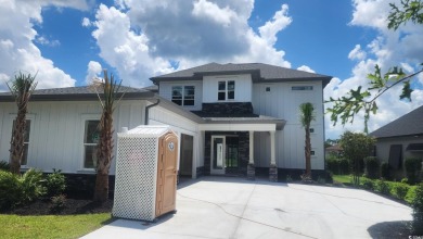 Welcome to this stunning new construction home in the on Wild Wing Plantation in South Carolina - for sale on GolfHomes.com, golf home, golf lot