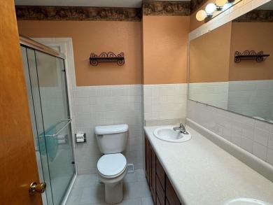 THIS ONE HAS IT ALL!! 3 bdrm, 1 3/4 bath, bonus room off kitchen on Cherokee Village North Course in Arkansas - for sale on GolfHomes.com, golf home, golf lot