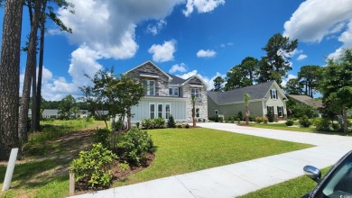 Welcome to this beautifully crafted custom home in the on Wild Wing Plantation in South Carolina - for sale on GolfHomes.com, golf home, golf lot