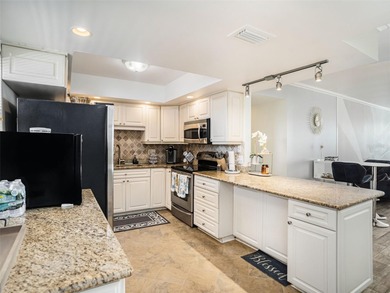 Welcome to your dream home at Point Brittany, one of the most on Isla Del Sol Yacht and Country Club in Florida - for sale on GolfHomes.com, golf home, golf lot