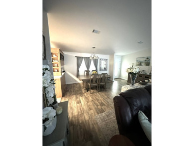 Welcome to this beautifully manicured and spacious 3-bedroom on Schalamar Creek Golf and Country Club in Florida - for sale on GolfHomes.com, golf home, golf lot