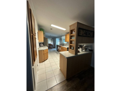 Welcome to this beautifully manicured and spacious 3-bedroom on Schalamar Creek Golf and Country Club in Florida - for sale on GolfHomes.com, golf home, golf lot