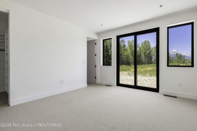 This stunning new 4,000 sqft home on 3.8 acres in the Fairway on Jackson Hole Golf and Tennis Club in Wyoming - for sale on GolfHomes.com, golf home, golf lot