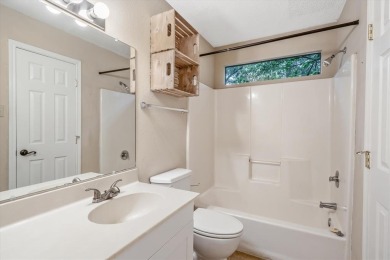 Adorable 3 bedroom home in tranquil wooded setting in highly on Holly Lake Ranch Golf Club in Texas - for sale on GolfHomes.com, golf home, golf lot