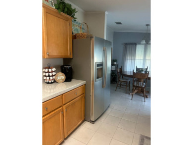Welcome to this beautifully manicured and spacious 3-bedroom on Schalamar Creek Golf and Country Club in Florida - for sale on GolfHomes.com, golf home, golf lot