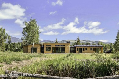 This stunning new 4,000 sqft home on 3.8 acres in the Fairway on Jackson Hole Golf and Tennis Club in Wyoming - for sale on GolfHomes.com, golf home, golf lot