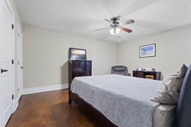 Situated on an oversized corner lot in the gated community of on The Coves Golf Course in Oklahoma - for sale on GolfHomes.com, golf home, golf lot