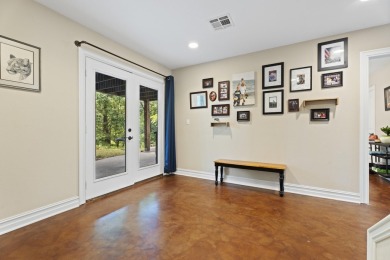 Situated on an oversized corner lot in the gated community of on The Coves Golf Course in Oklahoma - for sale on GolfHomes.com, golf home, golf lot