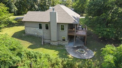 Situated on an oversized corner lot in the gated community of on The Coves Golf Course in Oklahoma - for sale on GolfHomes.com, golf home, golf lot