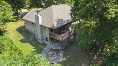 Situated on an oversized corner lot in the gated community of on The Coves Golf Course in Oklahoma - for sale on GolfHomes.com, golf home, golf lot