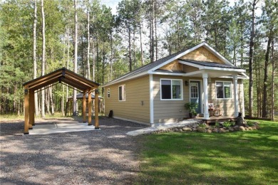 Not your average cottage! This 2023 built Timberland Cottage has on Voyager Village Country Club - Voyager in Wisconsin - for sale on GolfHomes.com, golf home, golf lot