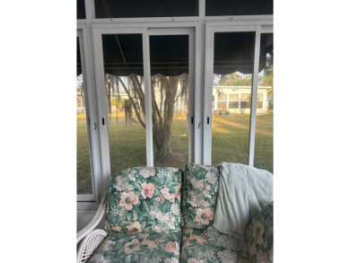 Welcome to this beautifully manicured and spacious 3-bedroom on Schalamar Creek Golf and Country Club in Florida - for sale on GolfHomes.com, golf home, golf lot