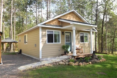 Not your average cottage! This 2023 built Timberland Cottage has on Voyager Village Country Club - Voyager in Wisconsin - for sale on GolfHomes.com, golf home, golf lot