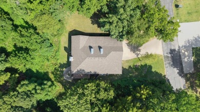 Situated on an oversized corner lot in the gated community of on The Coves Golf Course in Oklahoma - for sale on GolfHomes.com, golf home, golf lot