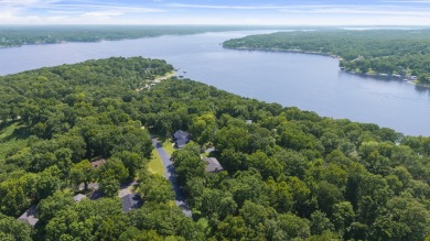 Situated on an oversized corner lot in the gated community of on The Coves Golf Course in Oklahoma - for sale on GolfHomes.com, golf home, golf lot